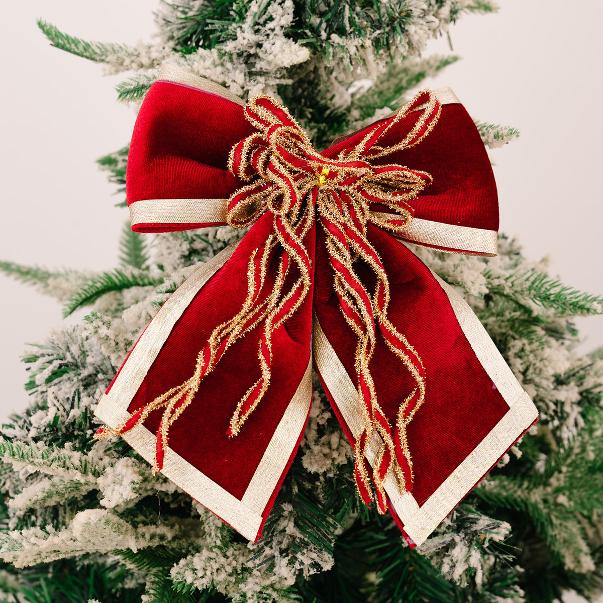Grand nœud rouge en velours luxueux – décoration de Noël