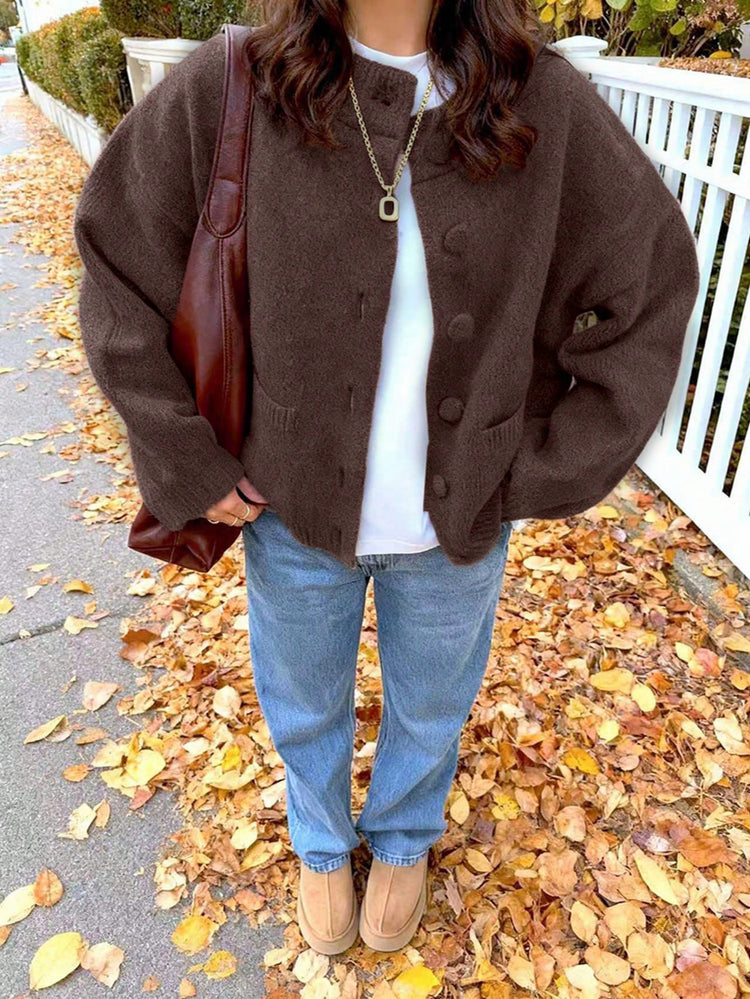 Gilet femme ample à col rond et deux poches